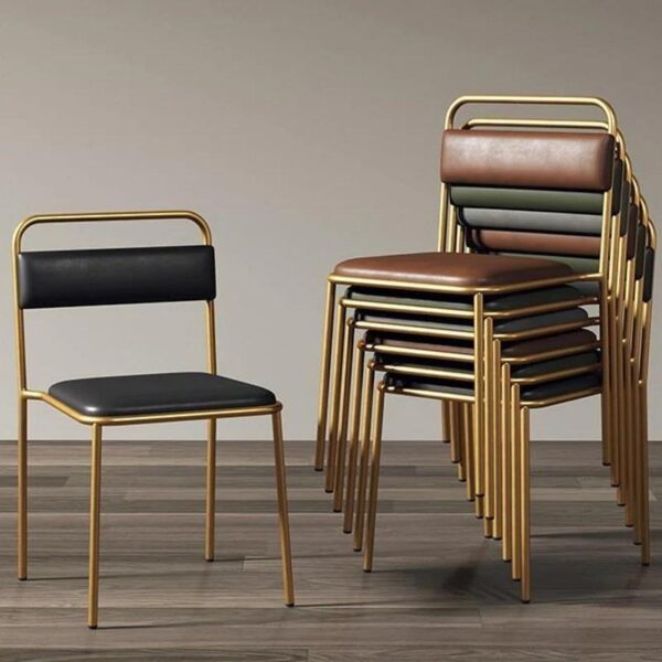 Elysium Stackable industrial dining chairs with gold frames and various faux leather colors