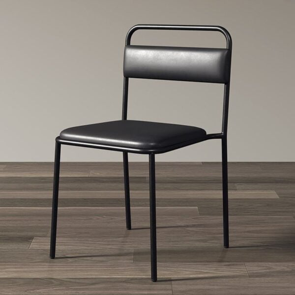 Black faux leather industrial dining chair with black steel frame