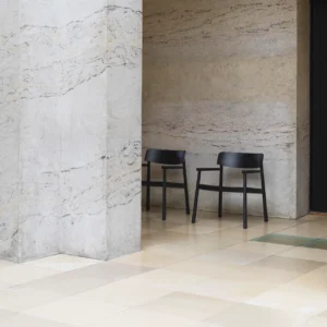 Tobi armchair in black in a minimalist interior setting