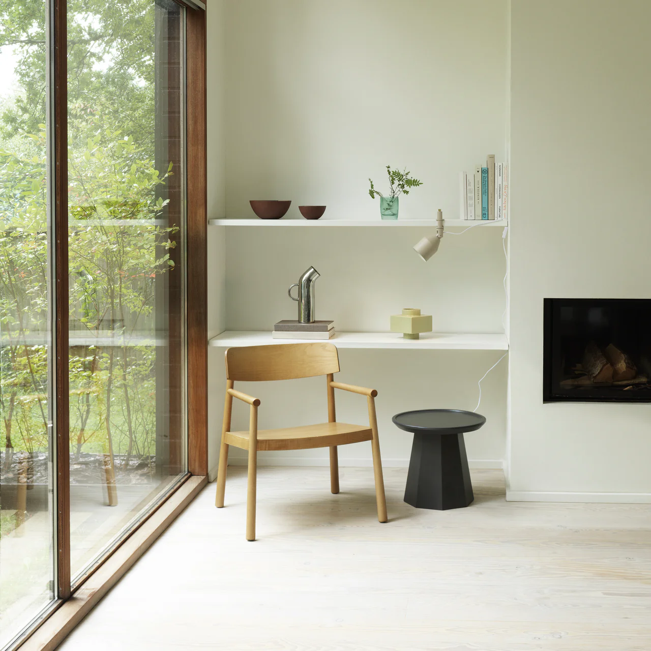 Tobi armchair, handcrafted by kersetna in a minimalistic interior setting, the armchair is made of solid and veneer ash wood, in a natural wooden finish