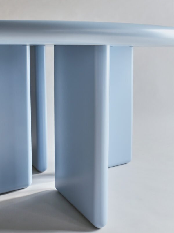 Close-up showing the legs of the blau round dining table