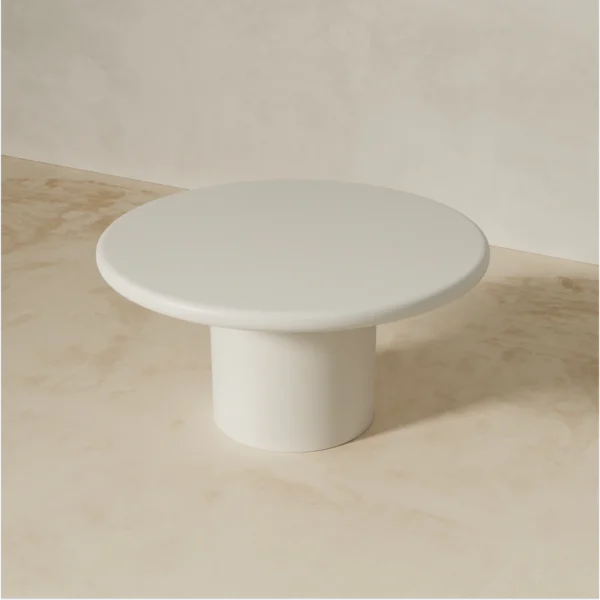 top view of Shiro white round dining table made of painted mdf by kersetna lebanon in a neutral setting