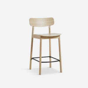Angled view of the yuri counter stool in oak