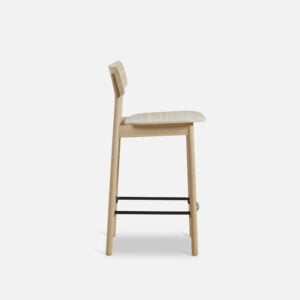 Side view of the yuri counter stool in oak