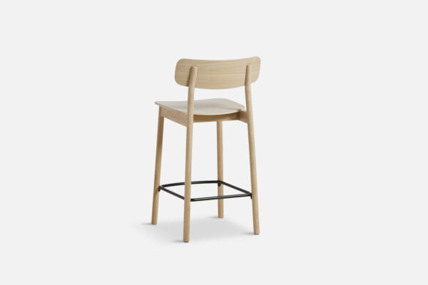 rear view of the Yuri counter stool in oak