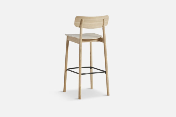 Rear view of the Yuri bar stool in oak