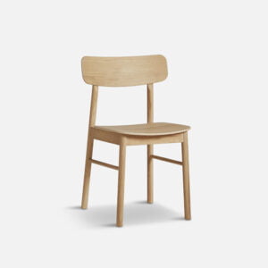 angled view of yuri oak dining chair