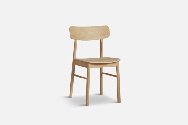 angled view of yuri oak dining chair