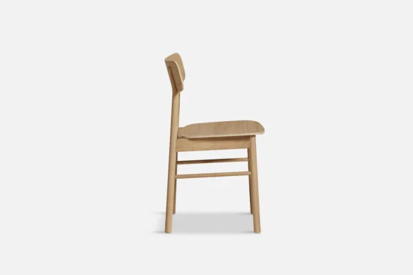 Side view of yuri oak dining chair