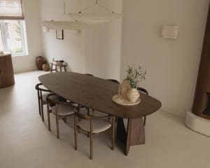 Oval dining table crafted in Lebanon from solid French oak and French oak veneer, designed for timeless gatherings