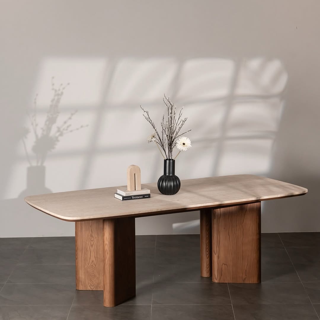 Contraria dining table , the table top is made out of travertino classico and the double bases are made of moisture proof mdf and Ash veneer