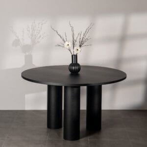 Tres round dining table in solid ash wood and ash veneer finished in black