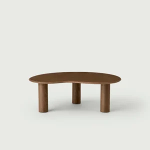 front view of olly coffee table, showing the craftsmanship behind its organic table top and its three cylindrical legs