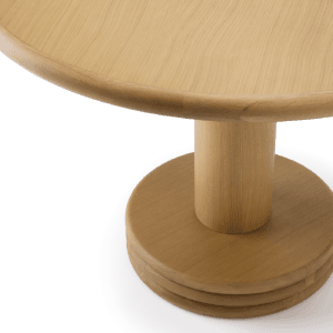 Top view of allure dining table showing the french oak top veneer and the solid wood base